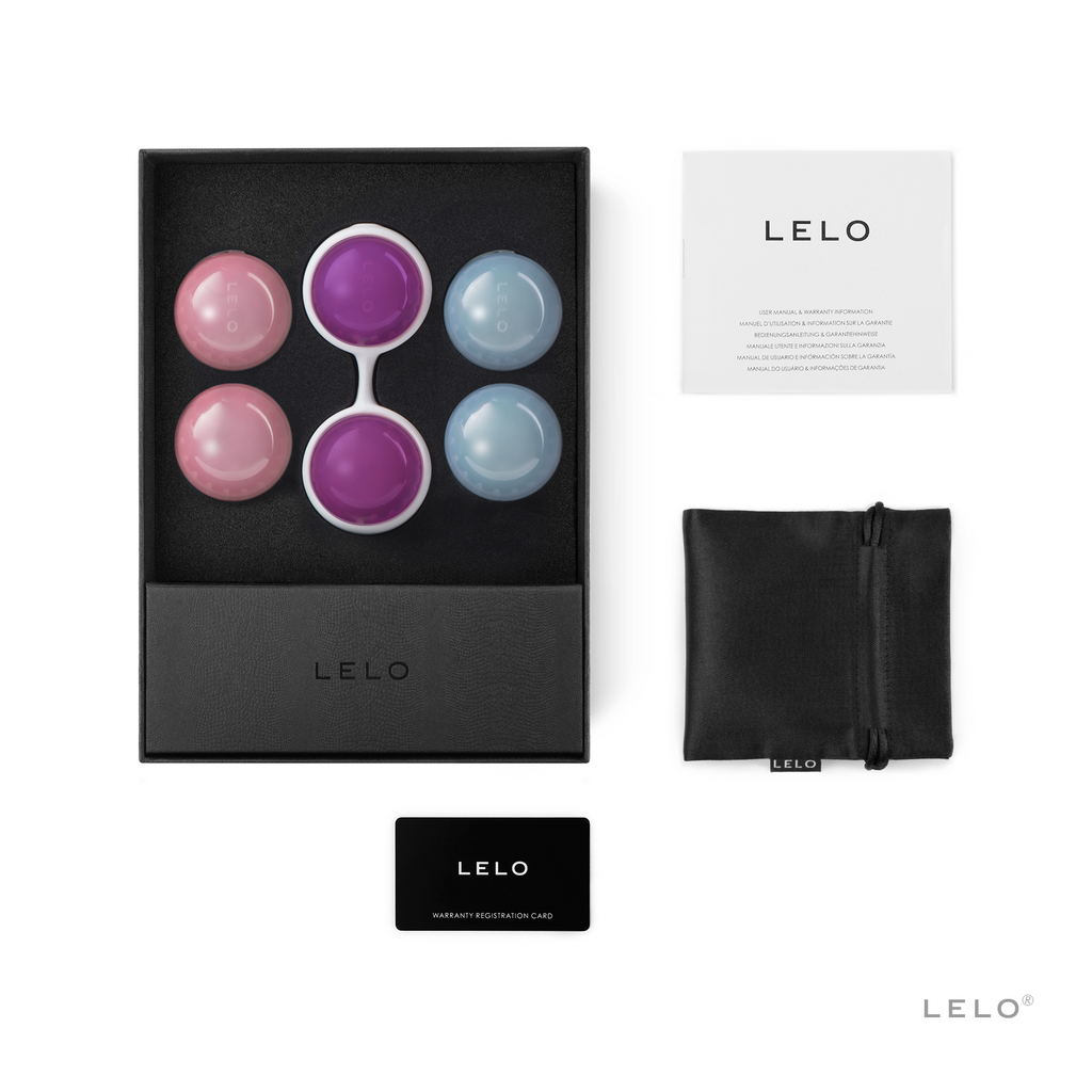 Full box contents of LELO sex toy, including three sets of weighted beads, carrying pouch, and manual/warranty.
