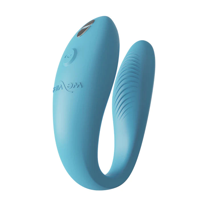 We-Vibe Sync Go Couples Vibrator in turquoise.