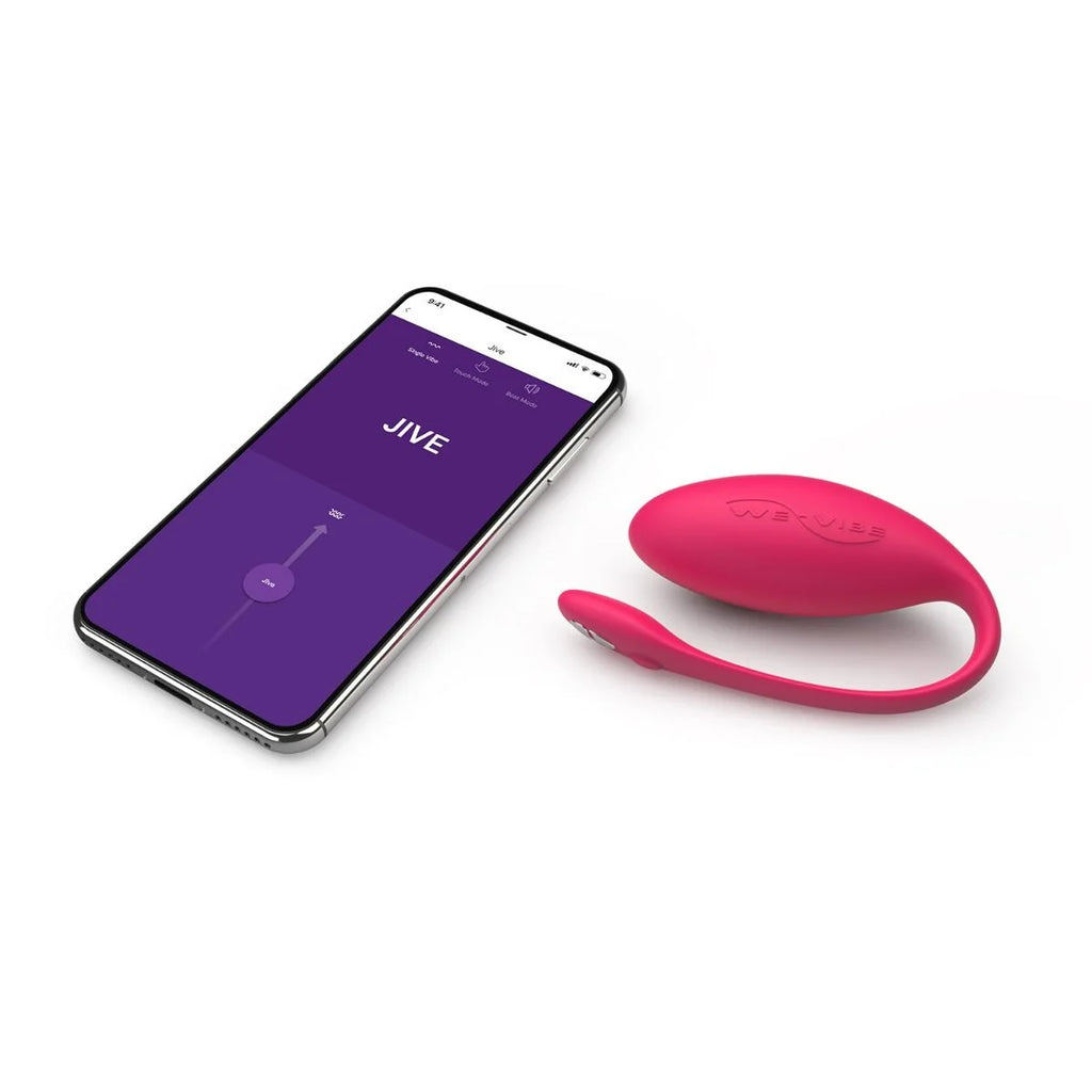 We-Vibe vibrator shown next to phone with app on display.