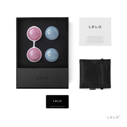 Full box contents, including kegel balls, carrying pouch, and manual/warranty.