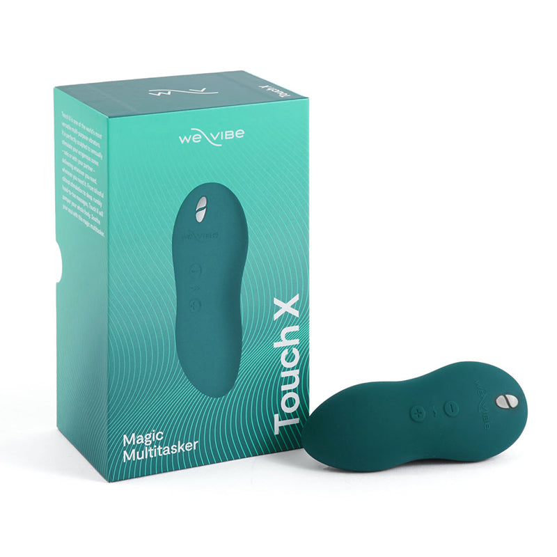 We-Vibe Touch X vibrator in velvet green, shown next to box.