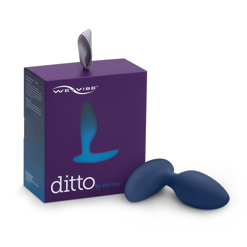 We-Vibe Ditto vibrator in blue, shown next to box.