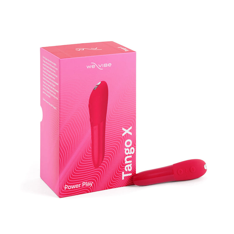 We-Vibe Tango X bullet vibrator in cherry red shown next to box.