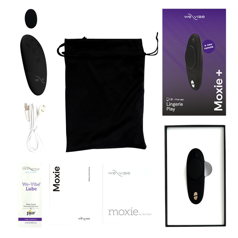 Full box contents for the We-Vibe Moxie wearable vibrator, including toy, magnetic clip, carrying pouch, charger, sample lubricant, and manual/warranty.